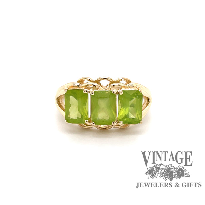 Estate 14 karat yellow gold emerald cut peridot 3 stone ring, front view