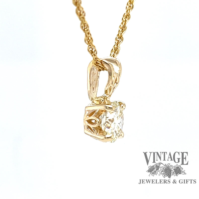 14k yellow gold .71 carat round brilliant diamond pendant, side view