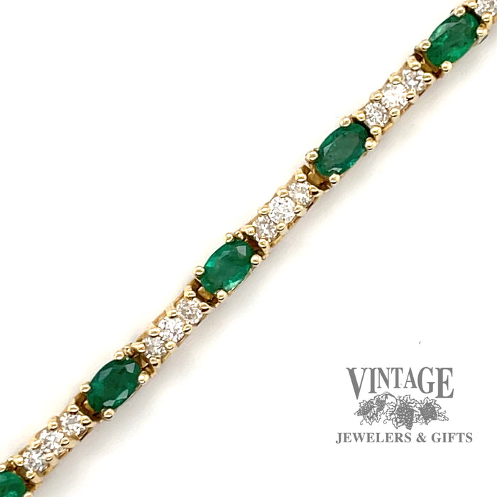 Yellow gold natural emerald and diamond tennis bracelet