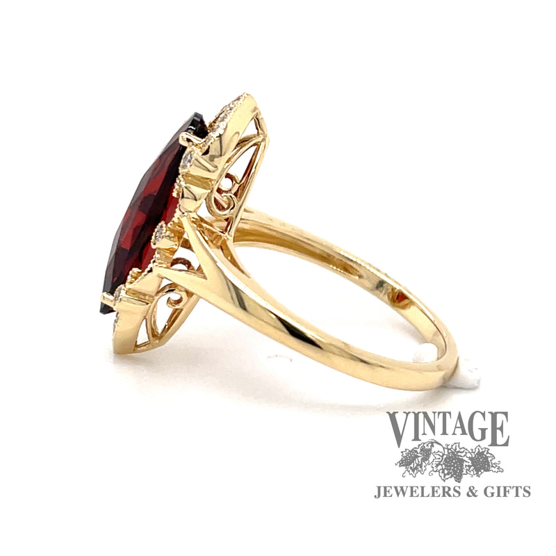 14 karat yellow gold 2.58 carat oval garnet and diamond ring, side view