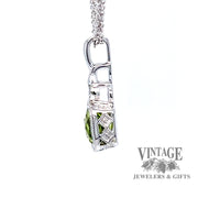 14 karat white gold checkerboard cushion cut natural peridot pendant, side view