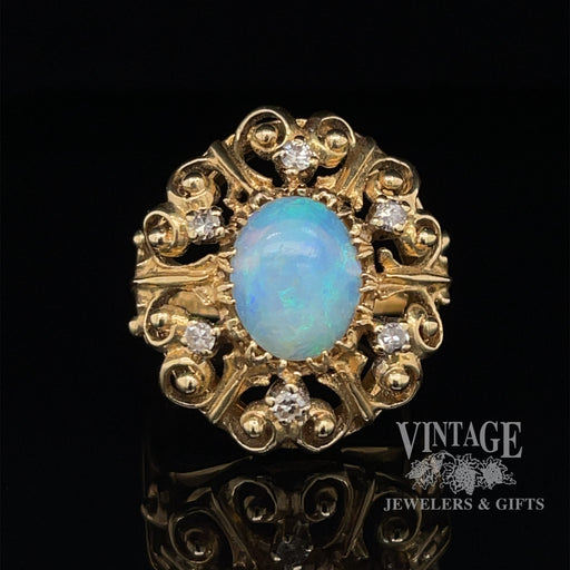 Opal and diamond 14ky gold scroll ring
