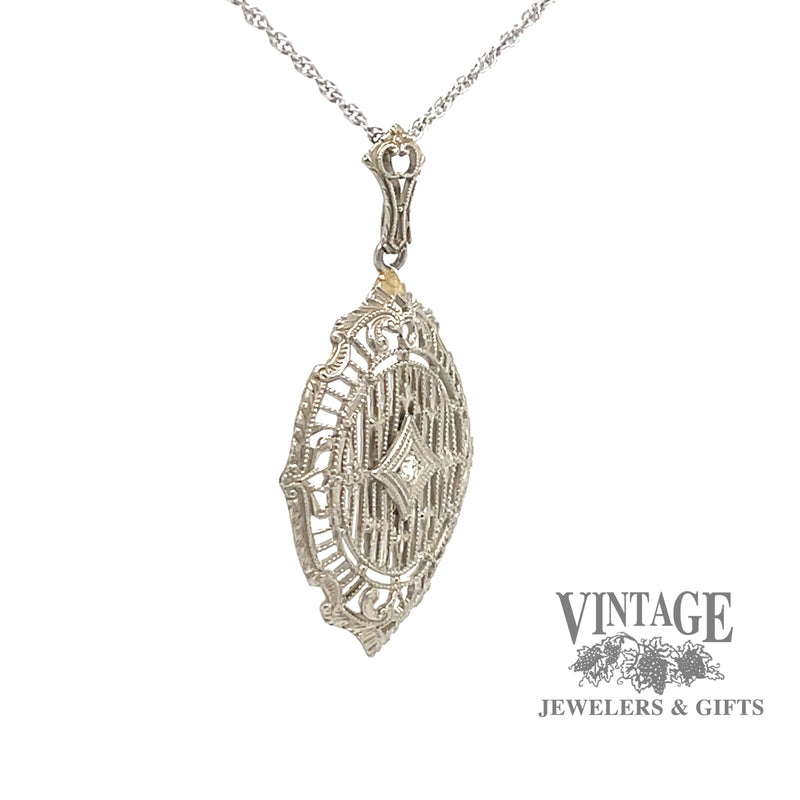 Filigree .02ct diamond pendant in 14kw gold