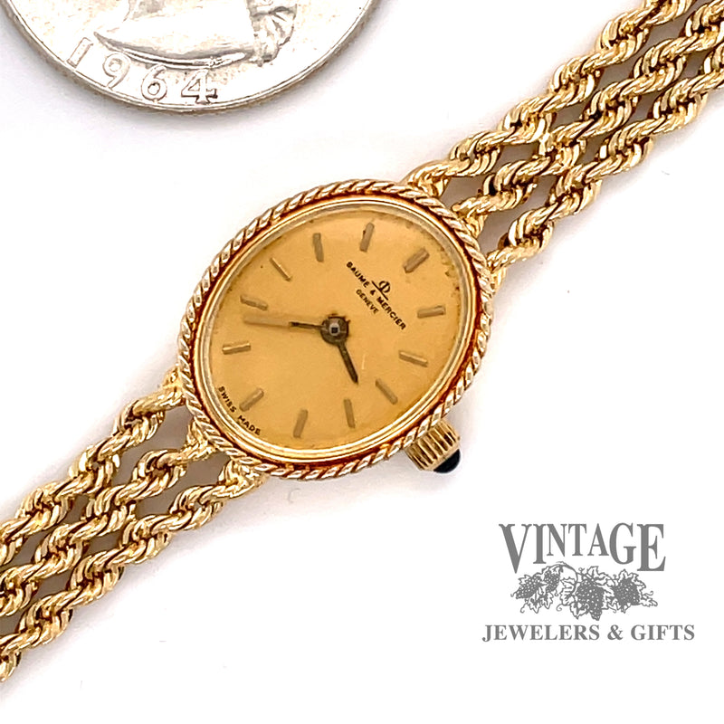 Ladies 14 karat yellow gold Baume & Mercier bracelet watch