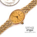 Ladies 14 karat yellow gold Baume & Mercier bracelet watch