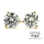 .63 carat 14ky gold diamond stud earrings close up