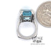 14 karat white gold custom Aquamarine and diamond ring, shown with quarter for size reference