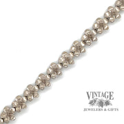 14 karat white gold 7.5" flower  bracelet