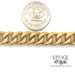14 karat yellow gold estate heavy curb link bracelet, with quarter for perspective