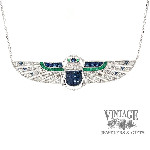 18 karat white gold Egyptian revival sapphire, emerald and diamond scarab  necklace