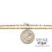 14 karat yellow gold 20" solid rope station chain, shown with quarter for size reference