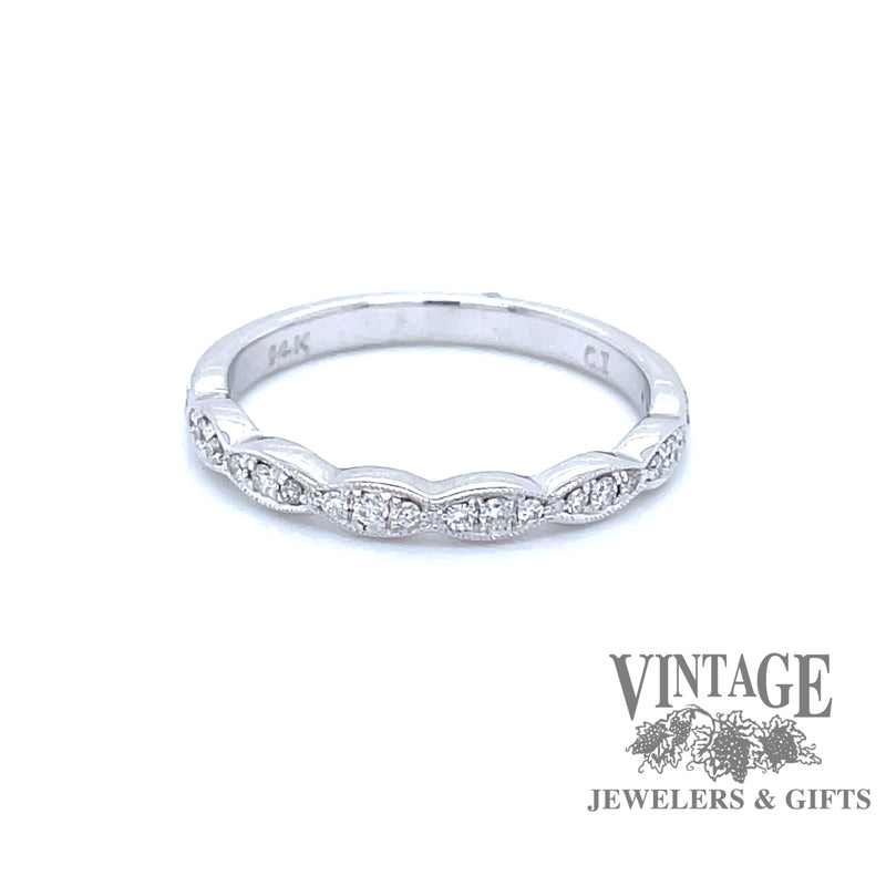 14 karat white gold diamond band.