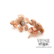 14 karat rose gold floral diamond earrings, angled