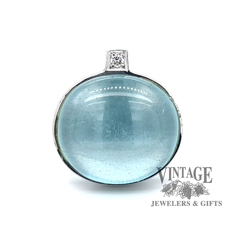 Modern aquamarine and diamond 18kw gold ring