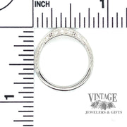 Curved 14kw gold diamond wedding ring band through finger