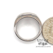 14 karat white gold diagonal 5 stone diamond ring, side view next to quarter for scale