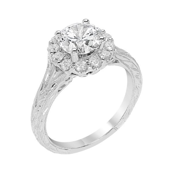 Hand engraved diamond halo 14kw gold for a 3/4 carat diamond.