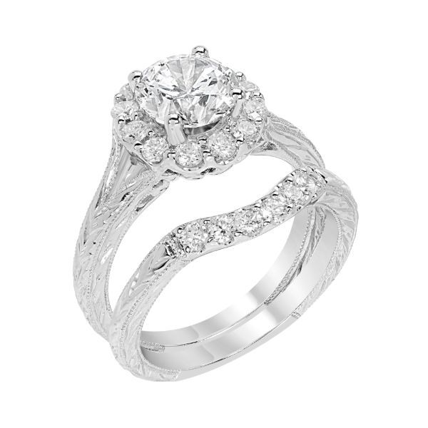 Hand engraved diamond halo 14kw gold for a 3/4 carat diamond.