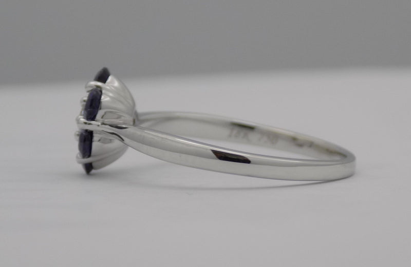 White gold blue sapphire and diamond ring.